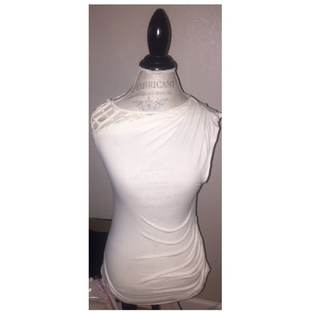 White tank top from purchased from Anthropologie.